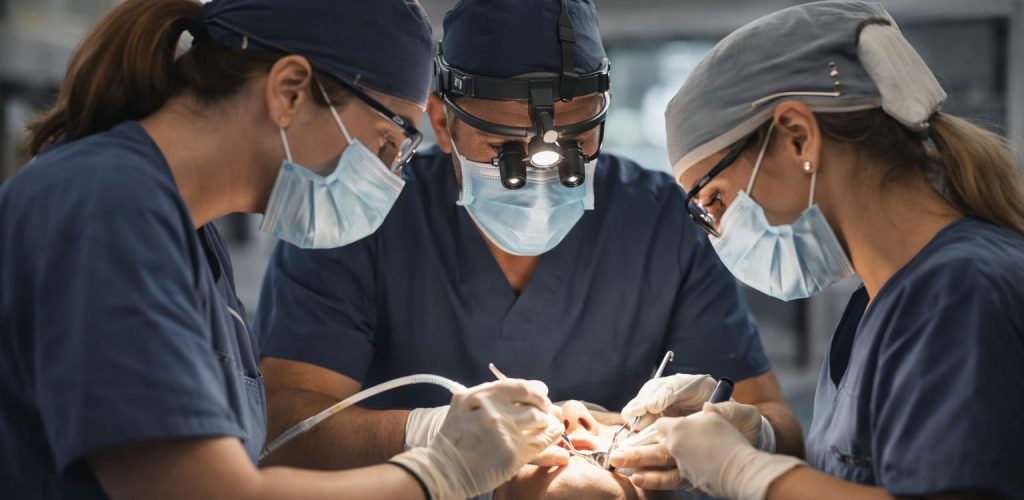 Dental team reviewing a patient case before dental treatment in Albania